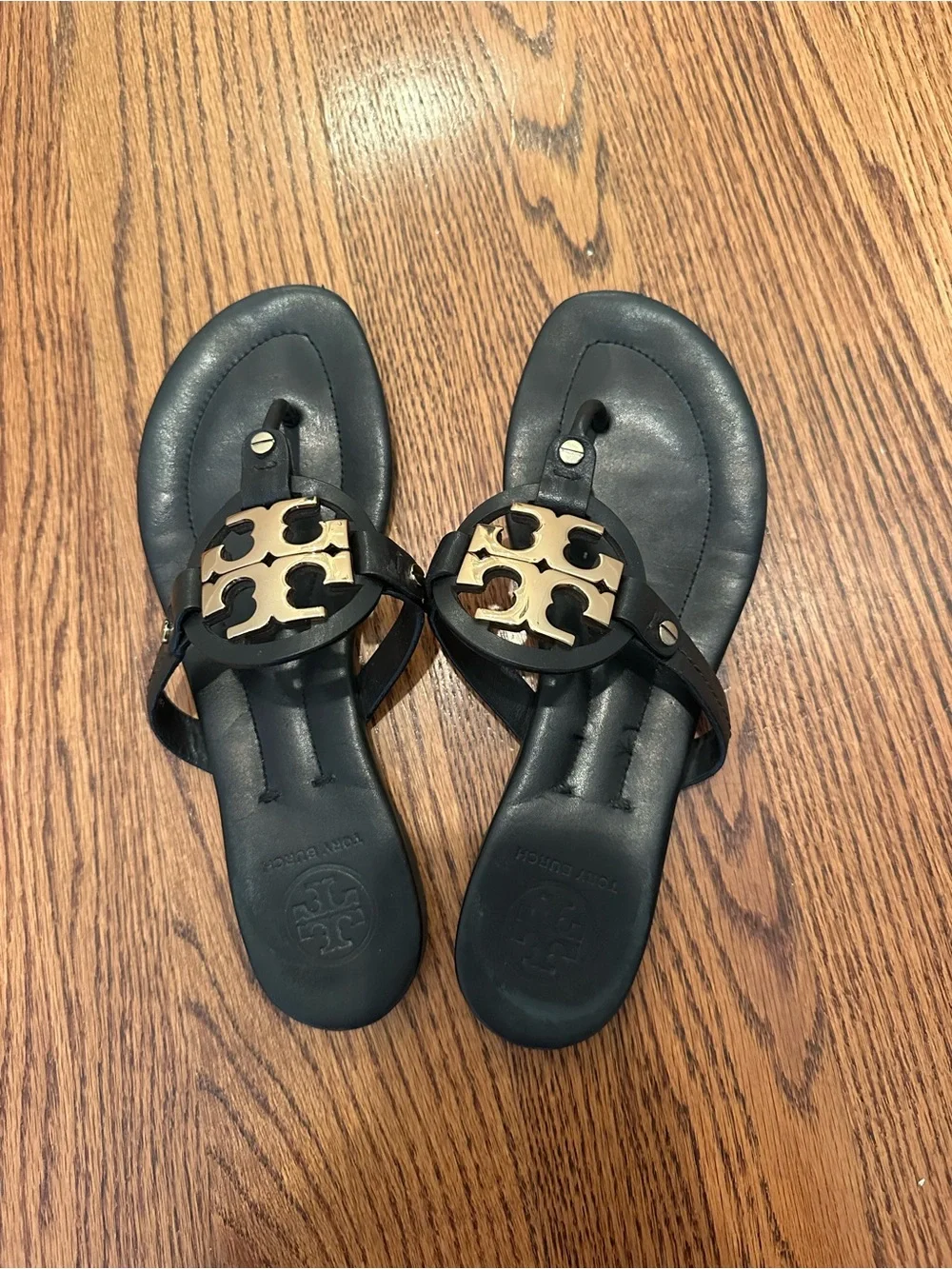 Tory Burch Black Leather Sandal with Gold Logo Medallion